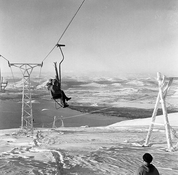 Two skiers seen here on the recently opened White Lady chair lift on Cairngorm 3rd