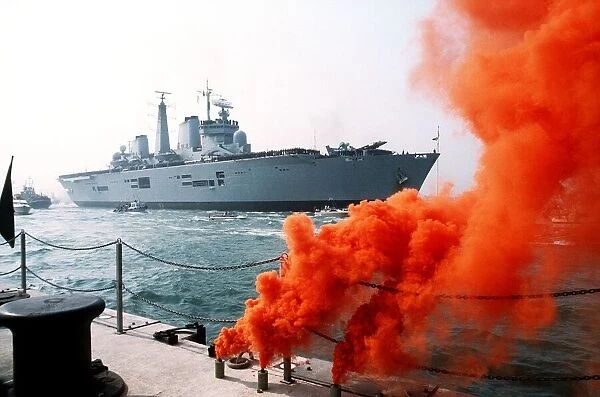 Smoke from flares welcomes HMS Invincible return to Portsmouth from the Falklands