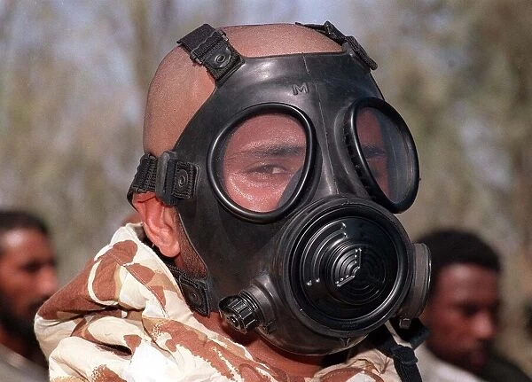 A soldier wears a gas mask in training Oct 1990 during the Gulf crisis