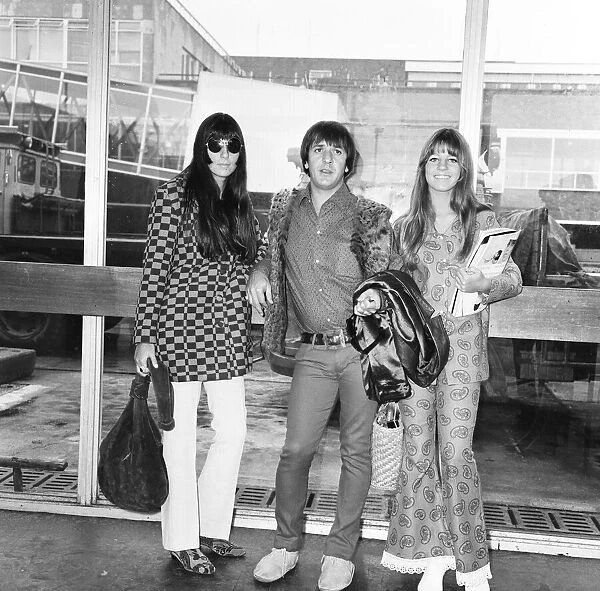 Sonny Bono & Cher, American music duo, pictured at London Heathrow Airport
