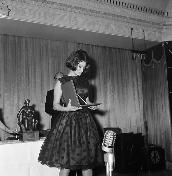 Sophia Loren at the British Film Academy Awards. Sophia Loren receives her award as