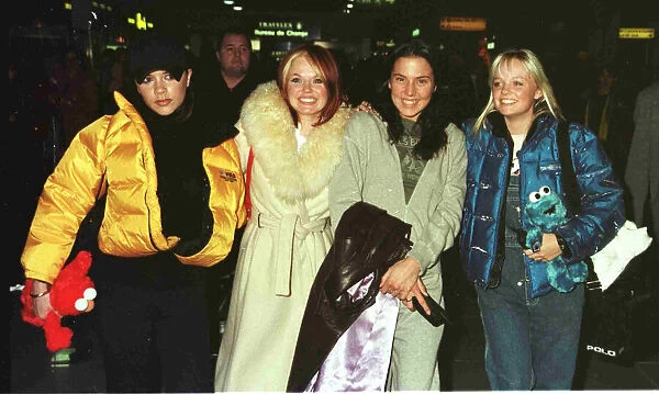 The Spice Girls at Heathrow Airport January 1998 Victoria Adams Geri Halliwell Mel