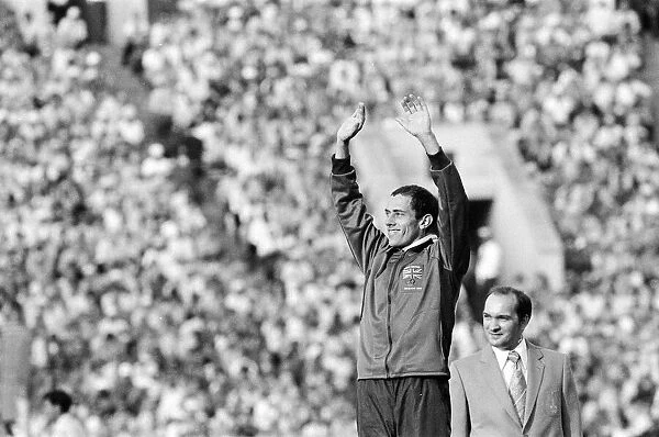 Steve Ovett acknowledges crowd during medal ceremony after Mens 1500 metres final at