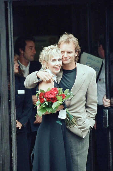 Sting holds and his bride Trudie Styler outside Camden register office, London
