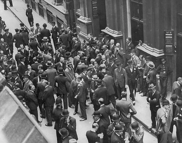 Stockbrokers and investors seen here at the Stock Exchange in 1931 following the banking