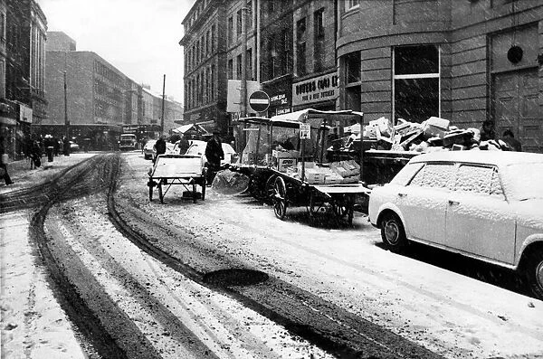Street traders trying to do buisiness on the wintry streets of Newcastle on 7th December