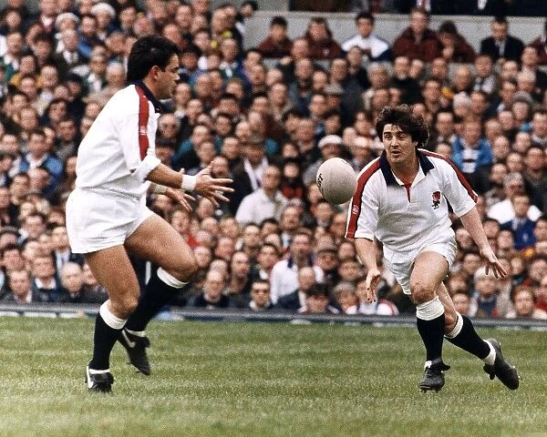 Stuart Barnes throws ruby ball to Will Carling in England v Scotland
