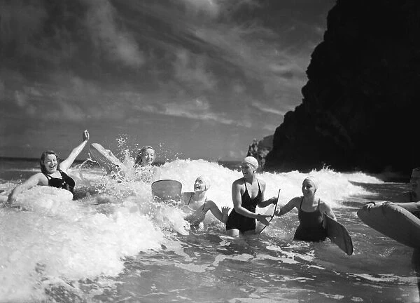 The Summer of 1934. Friends enjoying body surfing on a north Cornish beach Circa