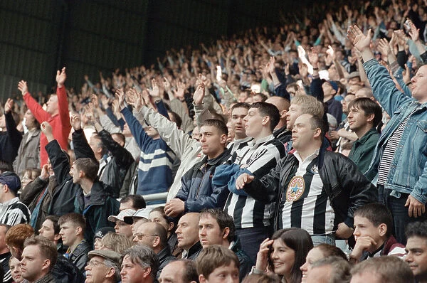 Supporters watching Newcastle United v Nottingham Forest