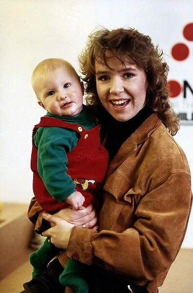 Susan Tully actress with baby Christopher Burtenshaw