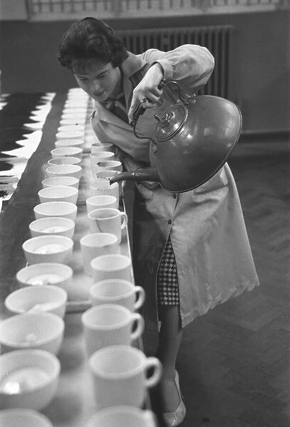 The tea taster at work. A sip, a quick taste and Mr Edward Pedvin, of Hollywood