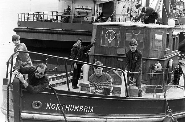 Teacher John Daws and pupils on board the Northumbira. A nautical studies department has