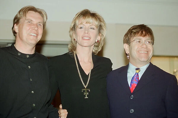 Theo and Louise Fennell with Elton John at the opening of 'Theo Fennell s'