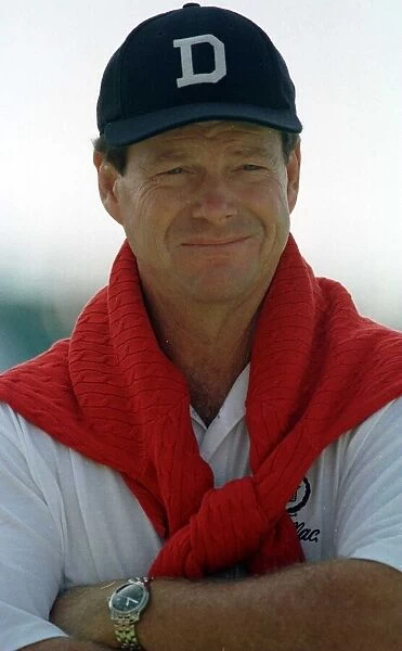 Tom Watson Open Golf Championship Carnoustie 1999 blue D cap orange jumper arms folded