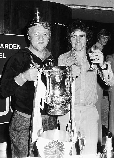 Tommy Docherty Football Manager holding FA Cup with the lid on his head
