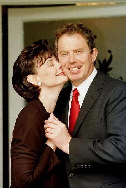 Tony Blair Labour Party Leader Prime Minister receives a kiss from his wife Cherie Blair
