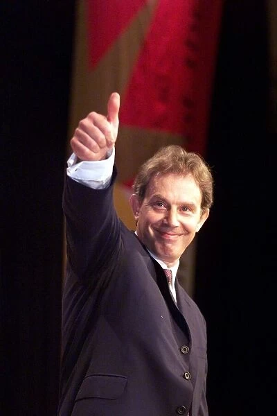 Tony Blair MP gives the thumbs up sign September 1999 after his speech to