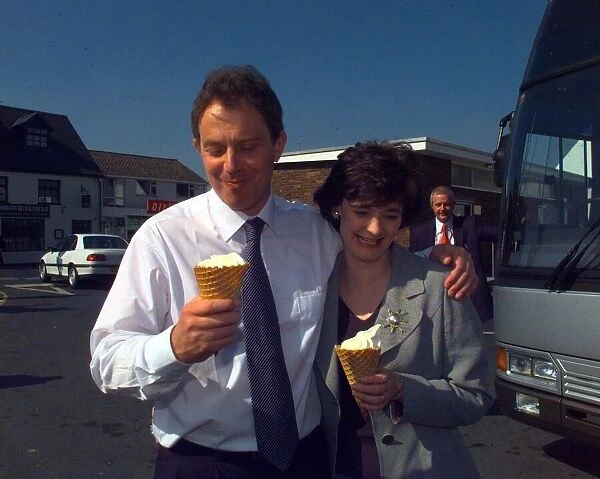 Tony and Cherie Blair enjoy ice cream on a hot sunny day in Monmouth during the April