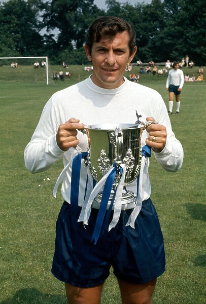 Tottenham Hotspur footballer Alan Mullery with the League Cup trophy August 1971