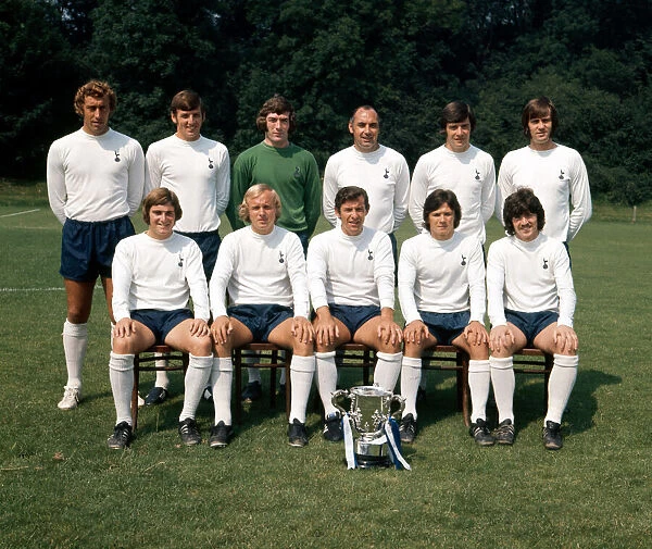 Tottenham Hotspur pose for a group photograph with the League Cup trophy August