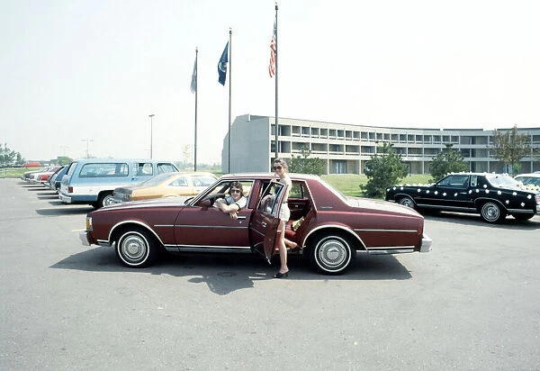 Trevor Francis poses next to his outside the Pontiac Silverdome