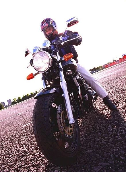 Trevor Walls sitting on a Yamaha XJR 1200 motorbike October 1998