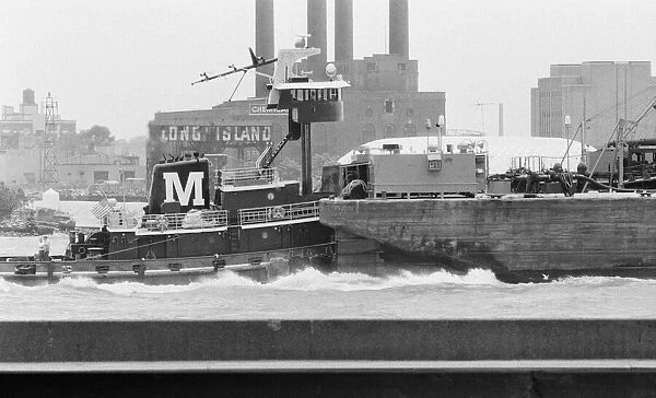 Tug in Long Island Sound with Schwartz Chemical Company building on Long Island City seen
