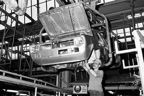 Volkswagen assembly line worker Peter Schredewitz at work in Wolfsburg, Germany