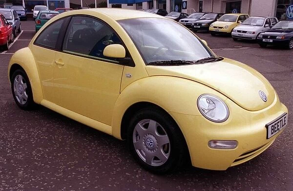 Volkswagen Beetle car April 1999 yellow