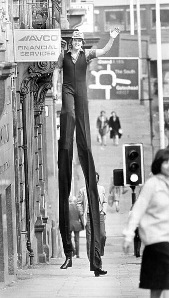 Walking Tall! World champion stilt walker John Long set some heads turning when he went