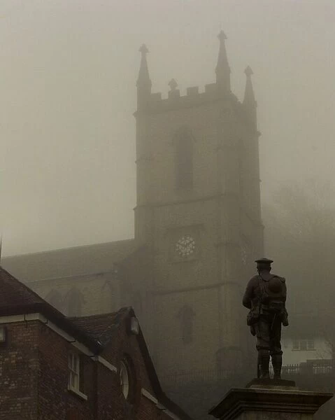 War memorial in Ironbridge. Statue of a soldier shrouded by the fog