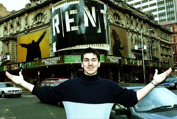 Wayne Moore April 1999 actor in the musical Rent, standing outside the Shaftsberry