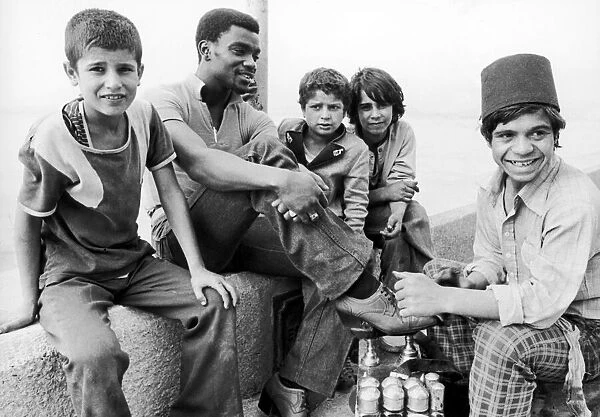 West Broms Laurie Cunningham in Turkey, gets a shoe shine to add some extra polish