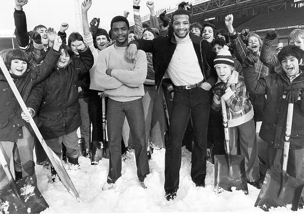West Bromwich Albion footballers Laurie Cunningham and Cyrille Regis with West Brom fans