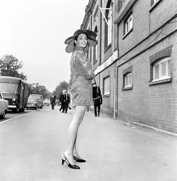 Woman wearing mini dress with large hat on the first day of Royal Ascot June 1970