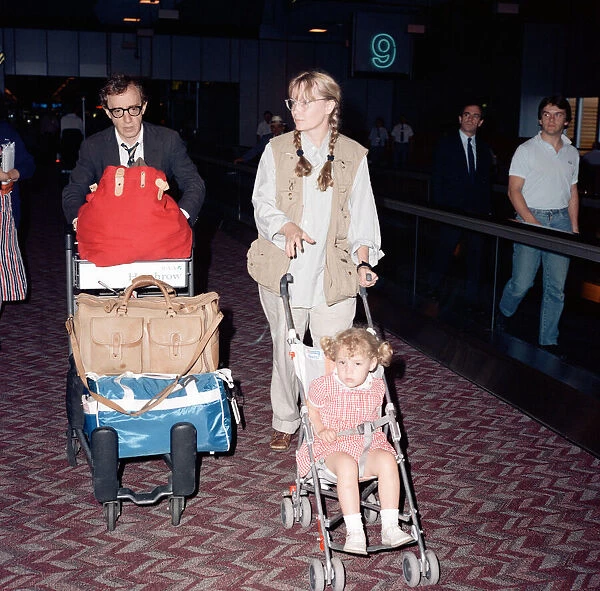 Woody Allen and his partner, actress Mia Farrow, with some of their children at London