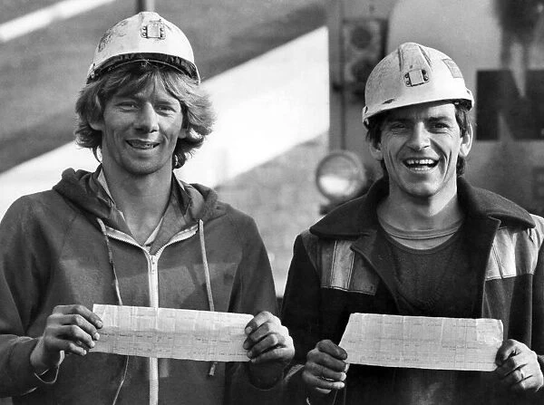 Working miners David Hunt (left) and Steve Owen with their pay-slips at Brookhouse