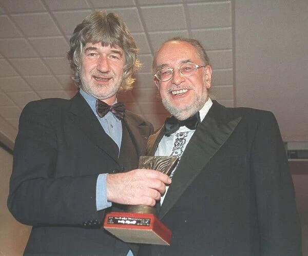 Writer Willy Russell receives his 1998 Scouseology award for best theatre production for