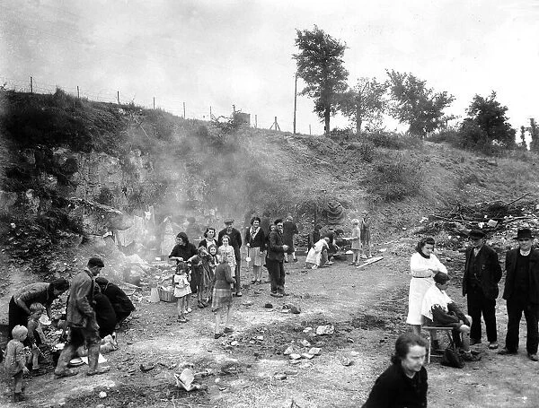 WW2 - Refugees from Caen living in the quarries
