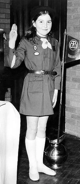 Nine year old Marion Scott in a 1974 Brownie Uniform. The current tinic costs about