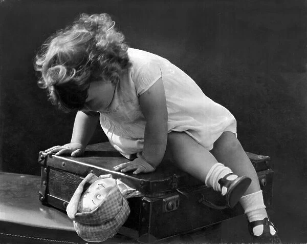 Young Girl Packing. 18th July 1937
