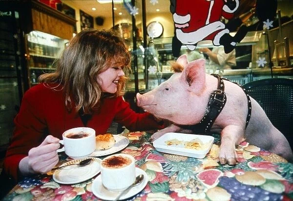 Young Women with Pig at Coffee Table - December 1995 girl at table