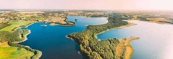 Braslaw District, Vitebsk Voblast, Belarus. Aerial View Of Nedrovo Lake, Green Forest Landscape. Top View Of Beautiful European Nature From High