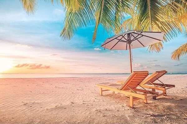 Tranquil beautiful beach. Chairs on the sandy beach near the sea. Summer holiday and vacation concept for tourism. Inspirational tropical landscape