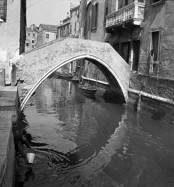 A bridge and a canal in Venice