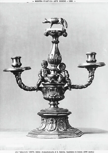 Bronze candelabra from XVII century, from St Catherine's Confraternity in Siena and exhibited in the Exhibition of Ancient Sienese Art in 1904