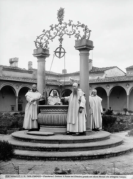Some Carthusian monks seen at the well of the Large Cloister, in the Certosa (Carthusian Monastery) of Galluzzo, on the outskirts of Florence