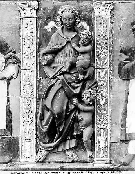 Charity, detail of the frieze decorating the Portico of the Ospedale del Ceppo in Pistoia; work by Giovanni della Robbia