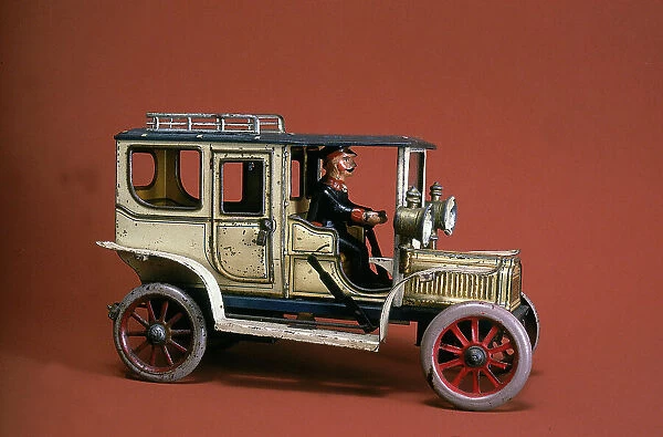 Deluxe toy automobile with glass windows and rubber wheels, made in Germany in the early 1900s