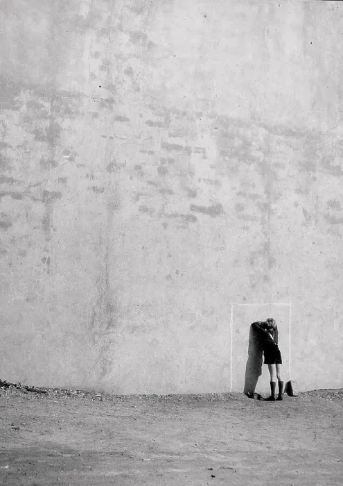 Framed Print : A boy counting against a wall during a game Framed Print : A boy counting against a wall during a game